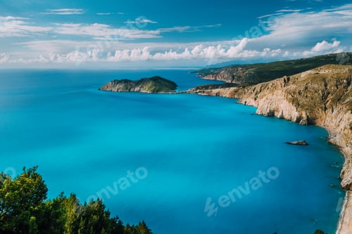 Preview: View of Kefalonia west coastline. Assos village town and Frourio peninsular. Beautiful milky blue