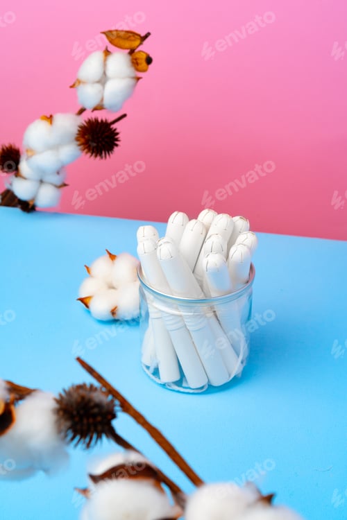 Preview: Female medical tampons on pink and blue background
