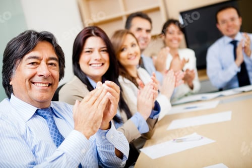Preview: Successful Business Team In A Meeting Applauding