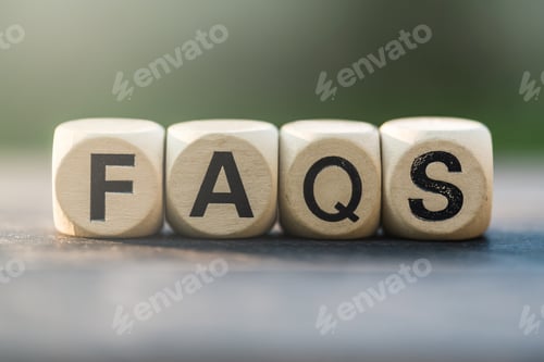 Preview: Faqs concept with wooden block on wooden table background