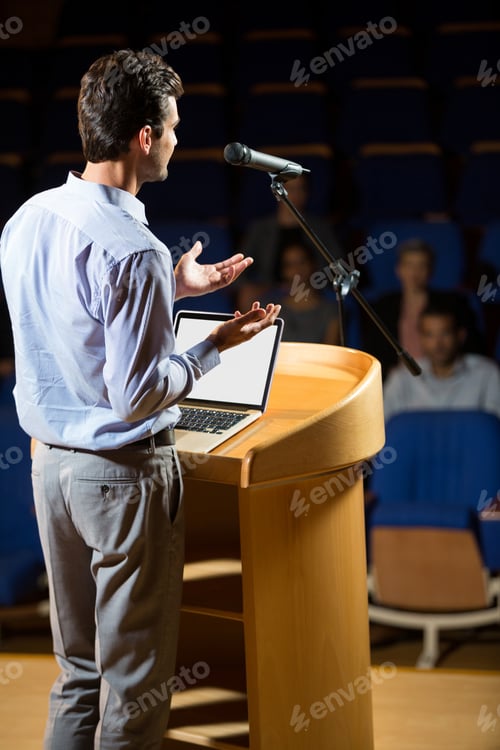 Preview: Male business executive giving a speech