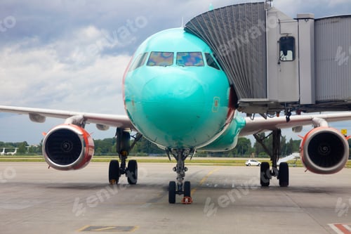 Preview: Boarding passengers on the plane through the boarding bridge. The plane lands at the international
