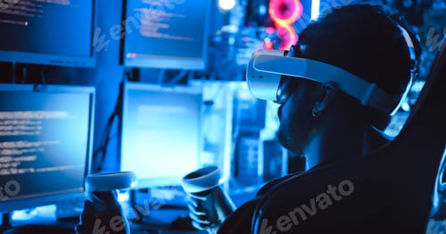 Preview: A hacker wearing virtual reality glasses is using computer to hack data to get ransom from victims.
