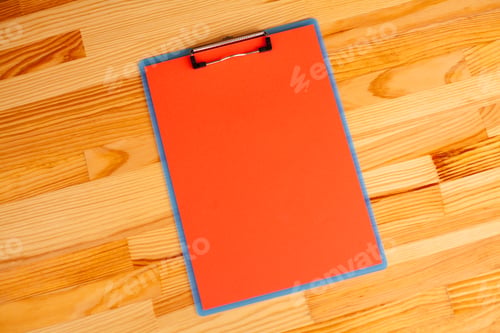 Preview: Blank Folder with Yellow Paper. Hand that Holding Folder and Handle on Wood Background.