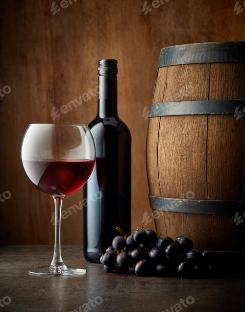 Preview: glass and bottle of red wine