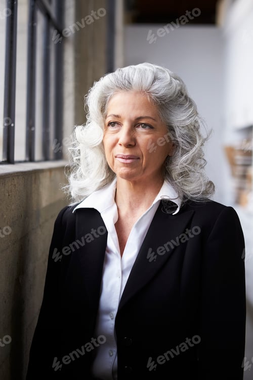 Preview: Senior white businesswoman looking away, portrait