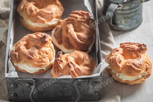 Preview: Sweet and tasty cream puffs as a small perfect dessert.