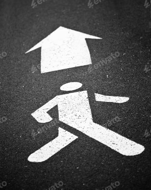 Preview: White Pedestrian Symbol Painted over Black Asphalt with Arrow Si