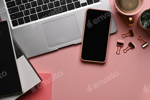 Preview: Flat lay office desk. Female workplace with smart phone, computer laptop and accessories.
