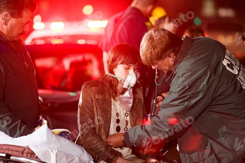Preview: Young woman receiving medical attention