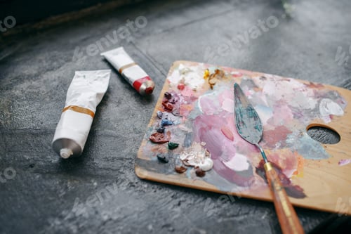 Preview: Colorful paints on palette closeup, nobody