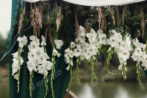 Preview: Beautiful stylish wedding aisle pathway with white flowers garland