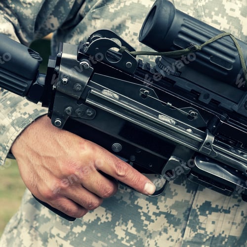 Preview: Soldier holding automatic gun