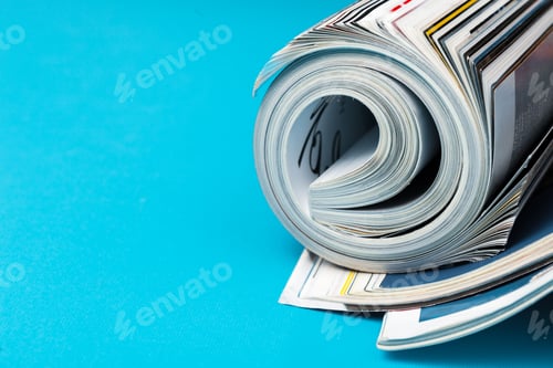Preview: Glossy magazine with pages rolled