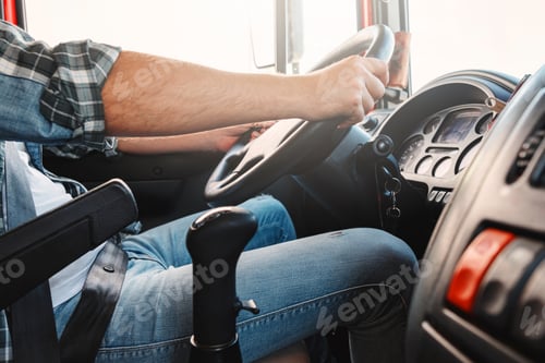 Preview: Male truck driver driving his big vehicle