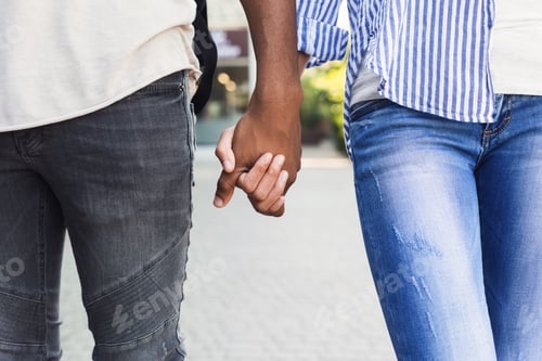 Preview: African-american couple in love walking in street park