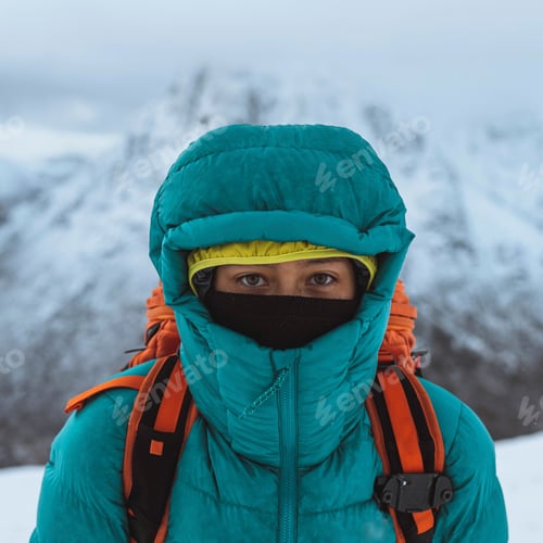 Preview: Female mountaineer climbing in wintertime at Glen Coe, Scotland