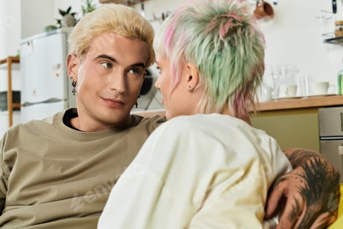 Preview: Young couple sharing a moment of love and happiness in a cozy indoor setting