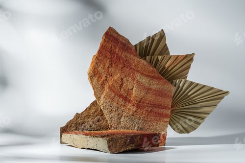 Preview: Piece of granite stone on white background with shadows