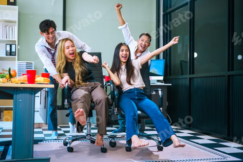 Preview: Four Asian friends, two men and two women, celebrate in an office party. They enjoy a fun-filled