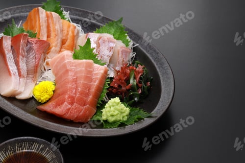 Preview: assorted sashimi; tuna(medium fatty), salmon, yellowtail, and sea bream. authentic Japanese dining.