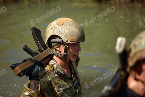 Preview: Full military experience - One day commando - running through the water with automatic rifle replica