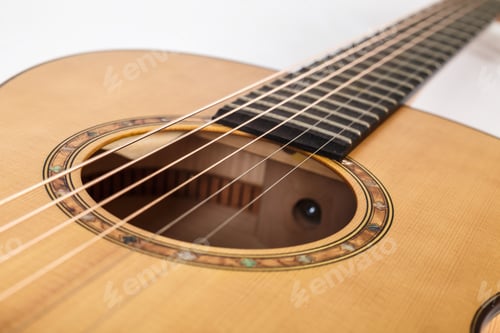 Preview: wood texture of lower deck of six strings acoustic guitar on white background. guitar shape