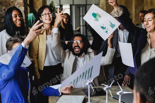 Preview: Business people celebrate renewable energy project success throwing documents at office - windmills