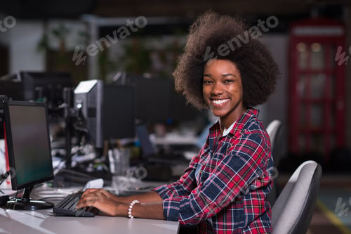 Preview: portrait of a young African American woman in modern office