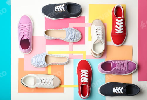 Preview: Flat lay composition with stylish new shoes on color background