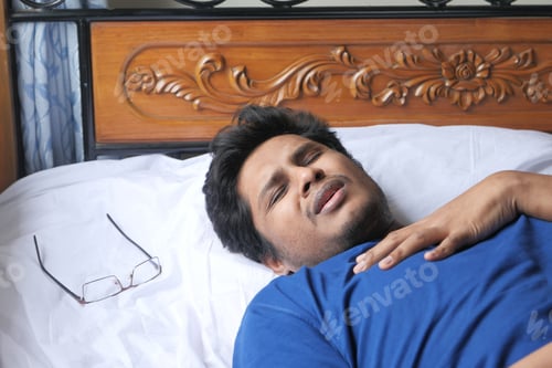 Preview: Sick young man in the bed, heart pain