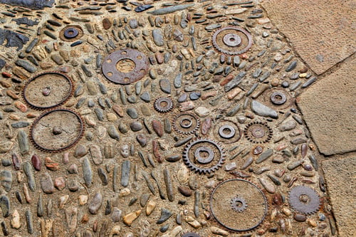 Preview: Floor with pattern from pebbles and rusty metal details