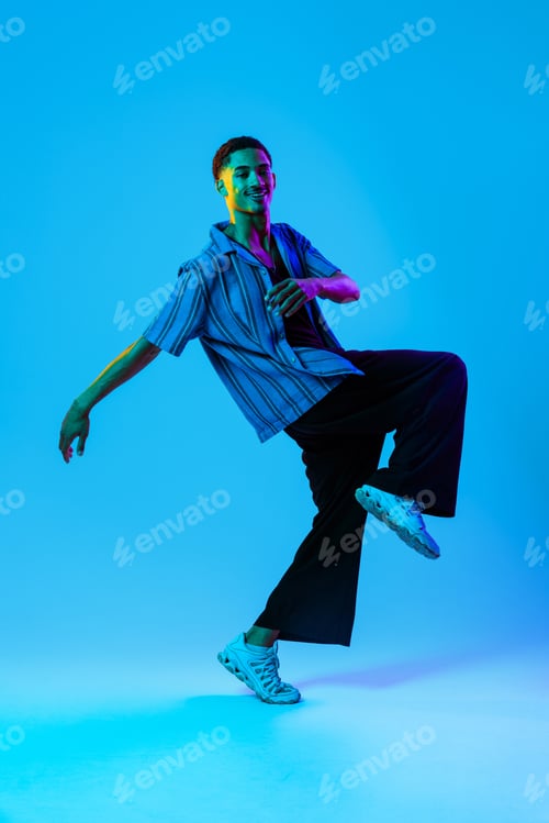 Preview: African man portrait in studio on colorful background