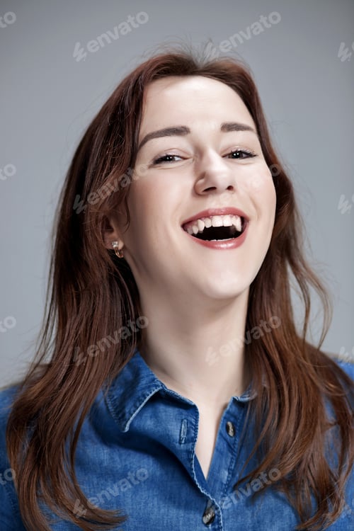 Preview: The Happy Woman On Gray Background