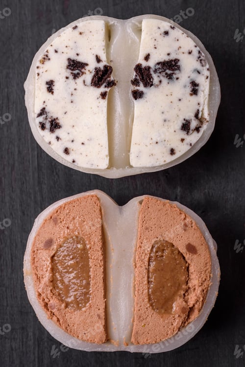 Preview: Delicious sweet mochi dessert with toppings on a dark concrete background