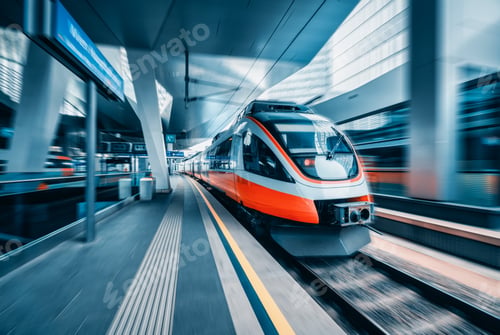 Vista previa: High speed train in motion at modern railway station