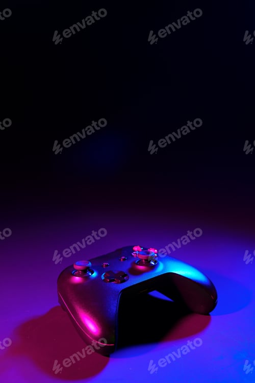 Preview: Gaming joystick on black background in neon light