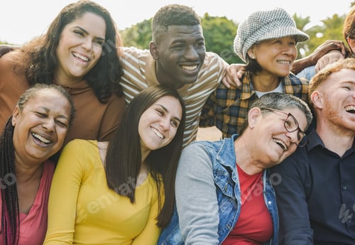 Preview: Happy multi generational people having fun hugging each other at city park
