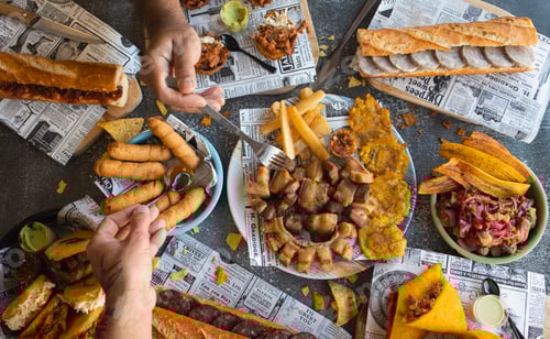 Preview: People sharing latin american street food feast