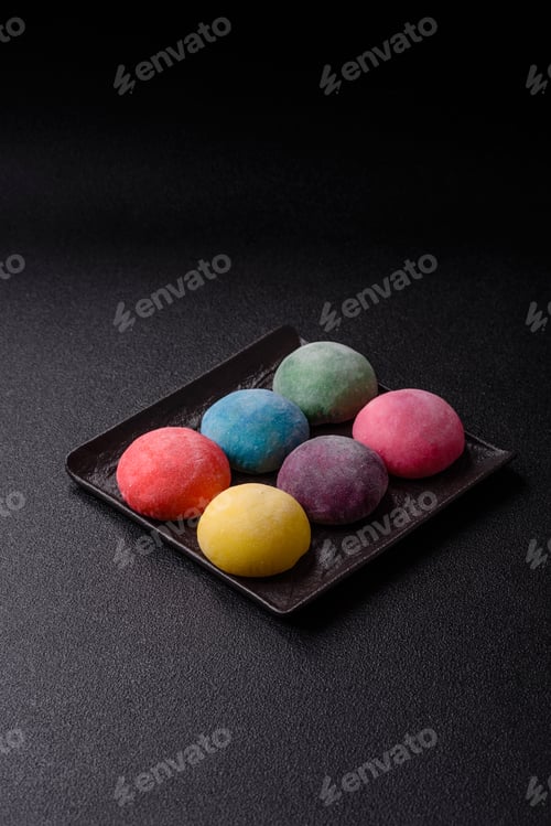 Preview: Japanese mochi, ice cream or Asian sweets with fruit filling. Mochi of different colors
