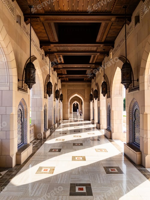 Preview: A stunning corridor with intricate arches, a beautiful tiled floor, and a wooden ceiling.