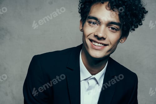 Preview: business man in suit curly hair cropped look self-confidence