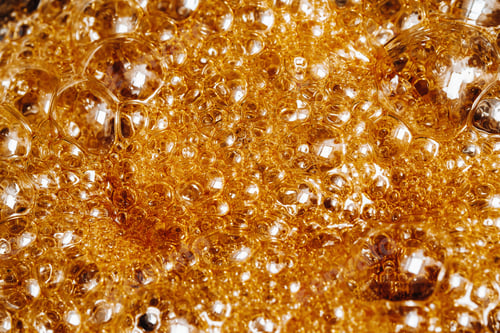 Preview: Preparation of sugar candies at home.A taste of our childhood.Background, sugar bubbles Texture