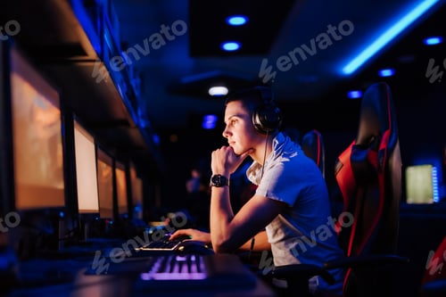 Preview: Side portrait of a pensive professional gamer. Internet, technology and people concept.