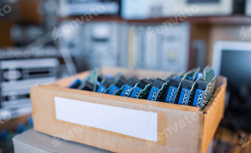 Preview: Close-up electric green embedded microcircuits in production