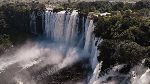 Preview: Kalandula Waterfall cascading majestically in Angola during the lush rainy season
