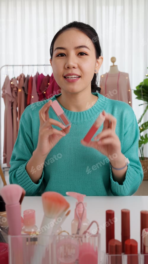 Preview: Asia woman micro influencer record live viral video camera at home studio.