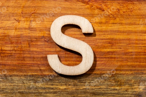 Preview: Wooden letters S on wooden background, top view
