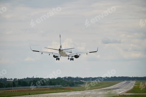 Preview: Commercial airplane flying in the sky.