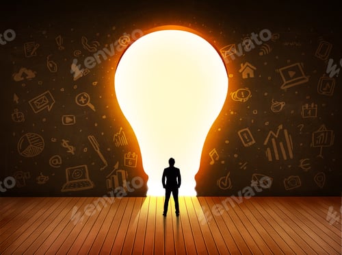 Preview: Business Man Looking At Bright Light Bulb In The Wall Concept
